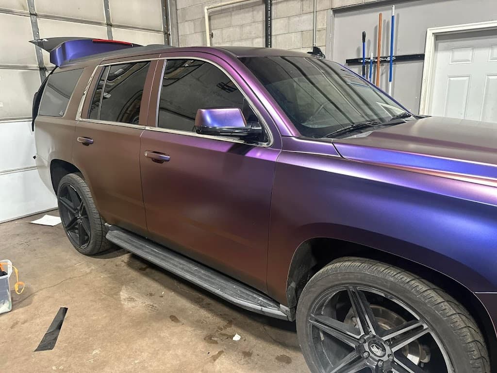 Black Widow wraps and tints. - Business Image