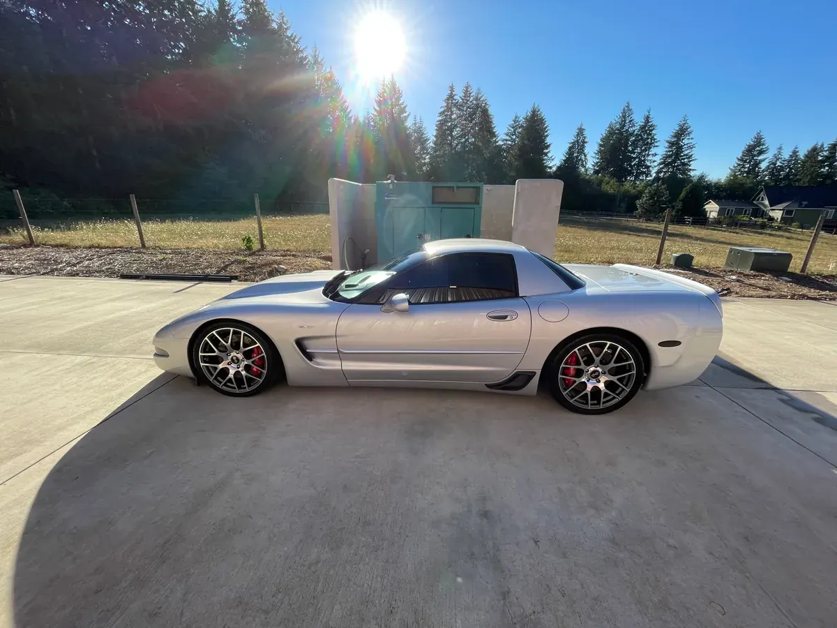 Silver C5 Corvette Z06 in direct sun after a full exterior detail