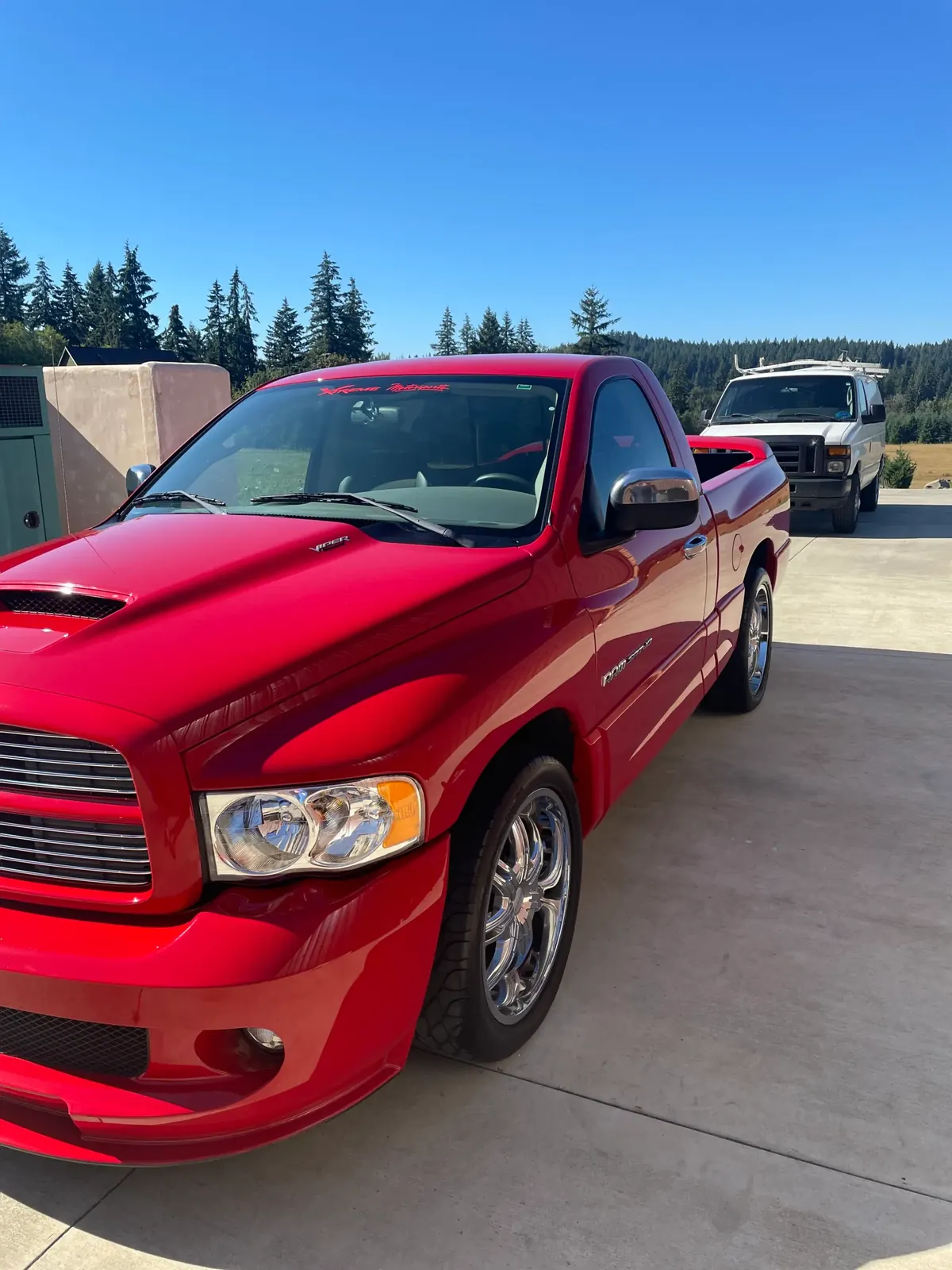 Red Dodge Ram SRT-10 with a high-gloss finish after detailing