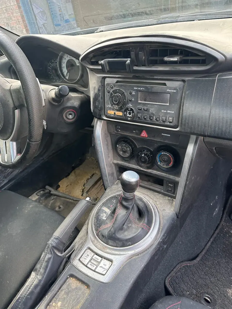 Before: Center console and shifter, interior detail