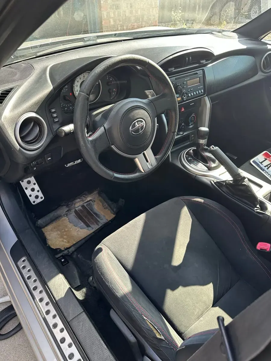 After: Driver footwell and seat, interior detail